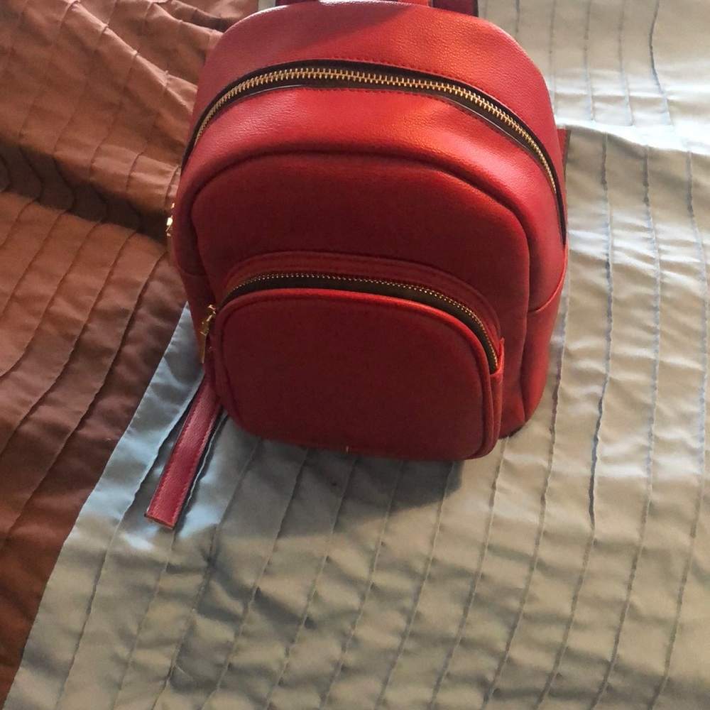 Nice red bookbag and is very cute